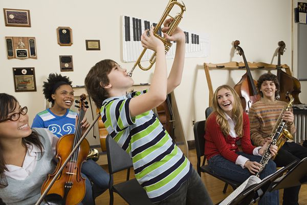 Boy playing Trumpet in the Classroom